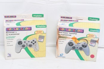 Dual Impact And Barracuda 2 PlayStation Controllers With Boxes