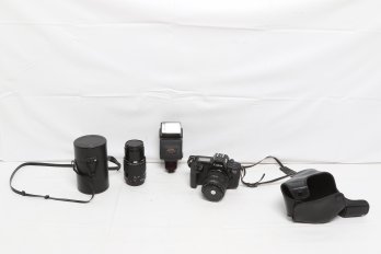 Canon EOS 650 35mm SLR Film Camera Together With Two Lenses And Flash