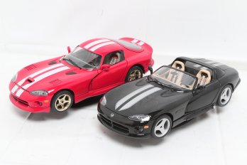 Two 1:18 Scale Collectible Car Models