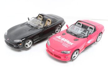 Two 1:18 Scale Collectible Car Models