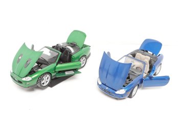 Two 1:18 Scale Collectible Car Models
