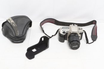 Nikon N60 35mm SLR Film Camera Together With Nikon AF Nikkor 35-80mm F/4-5.6 D Autofocus  Lens  And Cover