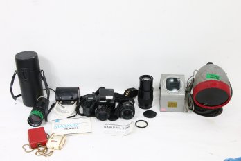 Group Of Vintage Photo Accessories Including Minolta Camera With Lenses And Flash