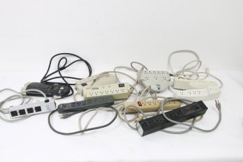 Group Of Used Power Surge Protectors And Power Strips