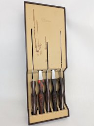 Set Of Cutco Knives And Forks With Marbled Handles In Rack