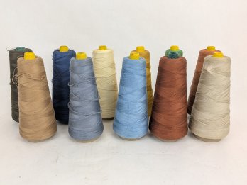 Group Of Yarn Thread Cone Spools