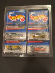 Hot Wheels Lot Of 4 In Plastic Holder