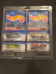 Hot Wheels Lot Of 4 In Plastic Holder