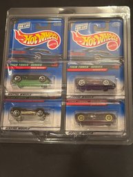 Hot Wheels Lot Of 4 In Plastic Holder