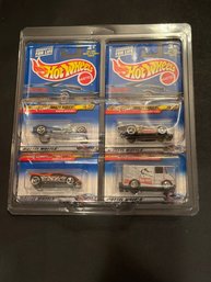 Hot Wheels Lot Of 4 In Plastic Holder