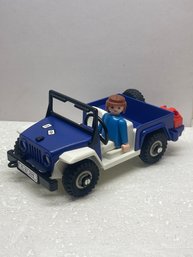 VINTAGE PLAYMOBIL 1981 BLUE JEEP WITH ONE FIGURE