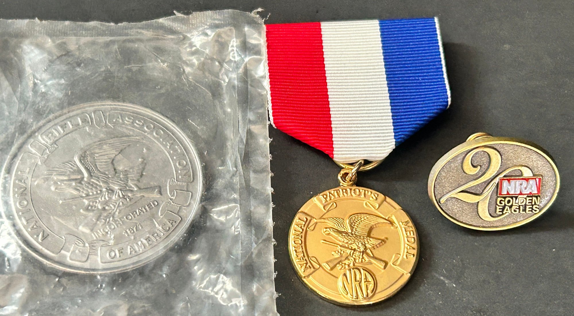 4 Pcs NRA - Medal, Lapel Pin And Pewter Coin #20000 | Auctionninja.com