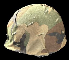 US Military Steel Helmet With Chin Strap And Liner With A Camo Cover