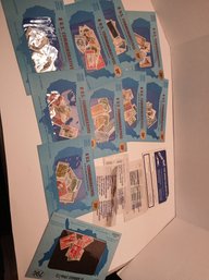 Lot Of 10 Commemorative US Stamp Sets And 4 Envelopes Of Unused Stamps Different Denominations