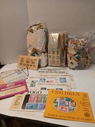 Lot Of 3 Mystery Stamp Filled Bags And 7 Commemorative Stamp Packets, JFK, Palestine, Etc...