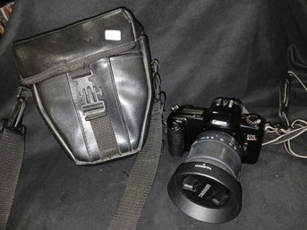 Camera- Canon EOS Rebel X 35 Mm Film Camera With 28-80 MM Tamron Zoom Lens With Matching Leather Case