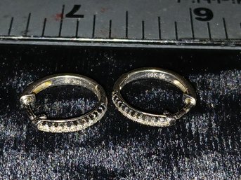 White Gold: 10K Earrings With 13 Small Diamonds Each  1.7grams