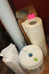 Lot Of Rolled Floor Batting, Vinyl, White Flags, And Bucket Of String