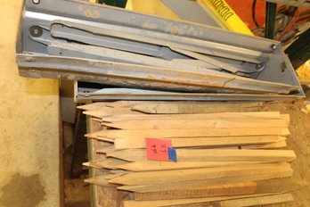 2 Metal Sawhorses And Wooden Stakes