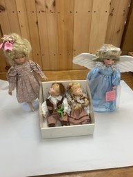 4 PIECE PORCELAIN DOLL LOT
