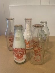 5 LIDDED MILK BOTTLES