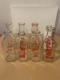8 MILK BOTTLES INCLUDING PINK BROOKFIELD BABY TOP BOTTLE