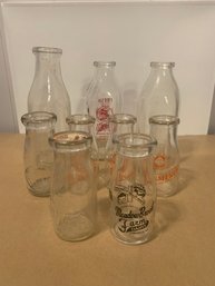 9 MILK BOTTLES