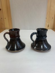 PAIR OF POTTERY MUGS