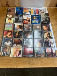 LOT OF COUNTRY CDS AND DVDS