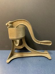 UNIVERSAL CAST ALUMINUM CITRUS HAND PRESS JUICER MADE BY L.F. AND C.  11'W X 9.5'H
