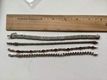 LOT OF 4 STERLING SILVER BRACELETS     40.4 GRAMS
