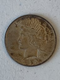1925 PEACE SILVER DOLLAR