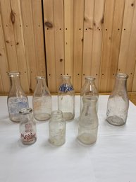 8 MILK BOTTLES
