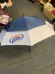 LIKE NEW MILLAR LITE ADVERTISING UMBRELLA, 48'W