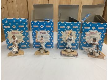 4 PORCELAIN SPORTS IMPRESSIONS FIGURINES