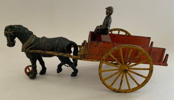 13 ¾' Long Cast Iron  Orange And Yellow Cart Pulled By A Single Black Horse
