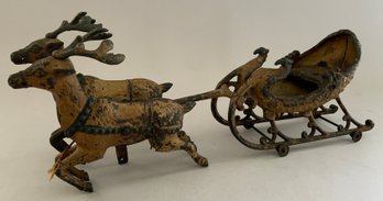 16 ' Long Cast Iron Gold Painted Sleigh Pulled By 2 Reindeer. Sleigh Has 4 Wheels