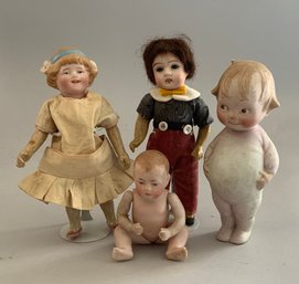 Lot Of 4 Small Dolls