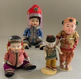 4  Small Oriental Dolls
