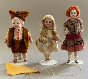 3  Small Dolls