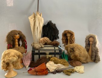 Assorted Lot Of Doll Wigs, Parasols, & Doll Trunk With Small Dolls