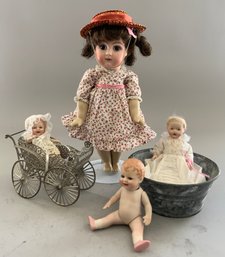 Lot Of 4 Small Dolls