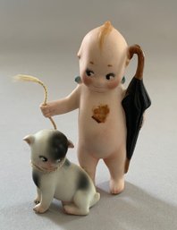 3  Kewpie Standing With Black Umbrella With The Doodle Dog Attached