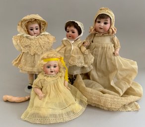 4  Small Bisque Dolls