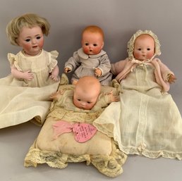 4  Bisque Baby Dolls