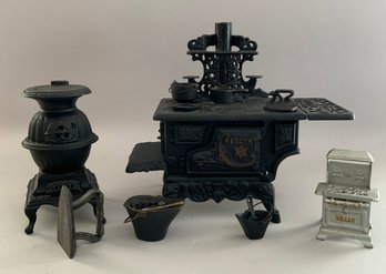 2  Childrens Cast Iron Wood Stoves & Access.