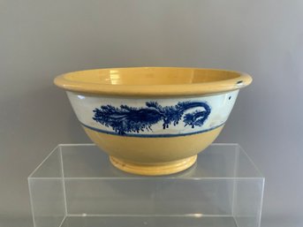 One 13x6.25 Yellowware Mixing Bowl Featuring A Prominent White Band Around The Middle