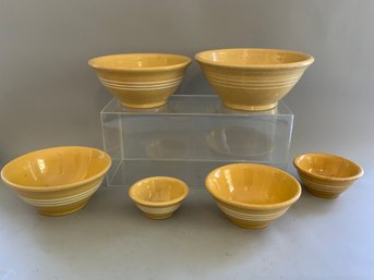 Six Piece Yellowware Mixing Bowls In Traditional Yellow Glaze With Three Prominent White Slip Bands