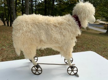 One 28.5x28 Sheep On Wheels With Red Red Velvet Collar And Bell