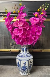 Blue And White Vase With Faux Orchids